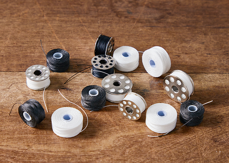 A selection of bobbins and hembobs.
